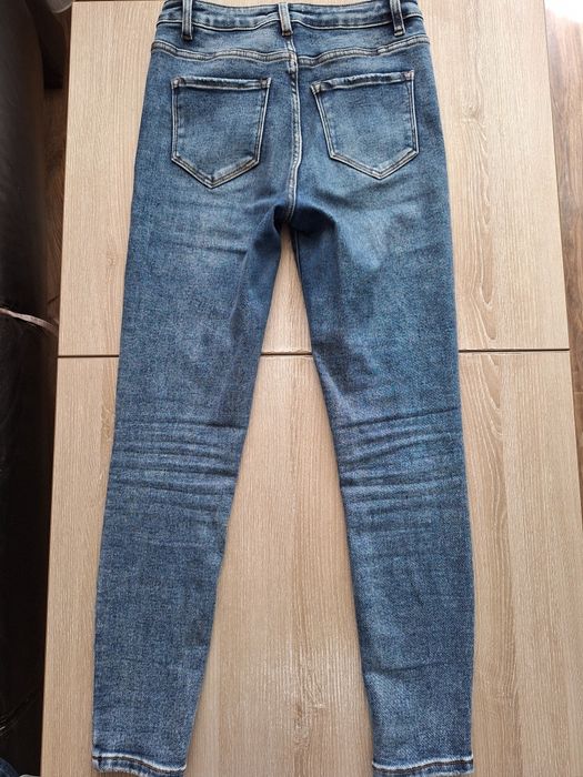 Damskie dzinsy skinny 38