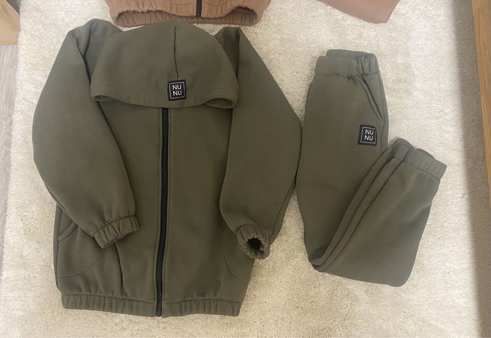 Dwa ocieplane dresy NuNu 128/134 stan idealny