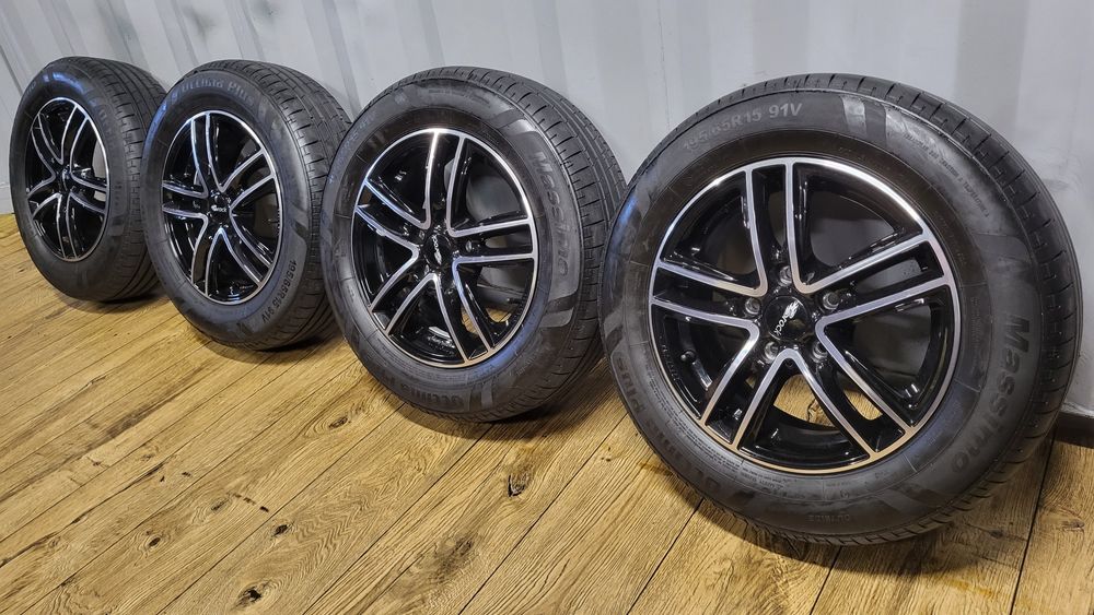 Felgi Brock 15" 5x112 z oponami 195/65 R15 Vw Golf Caddy Skoda Seat