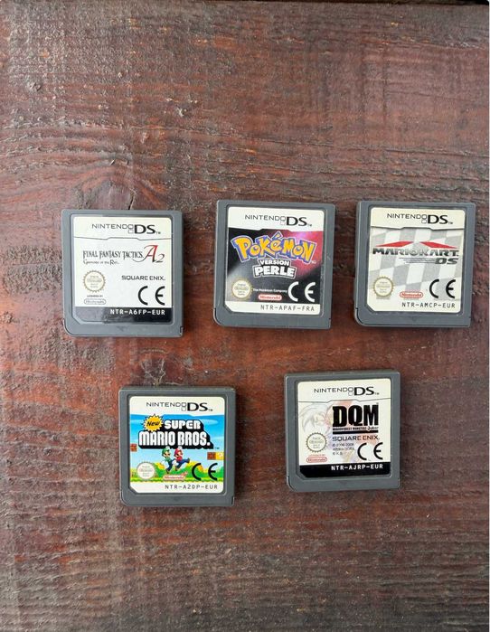 Nitendo DS light (plus 5 games, including pokémon perle)
