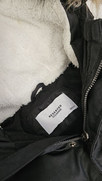 Чорний зимовий комбінезон з капюшоном