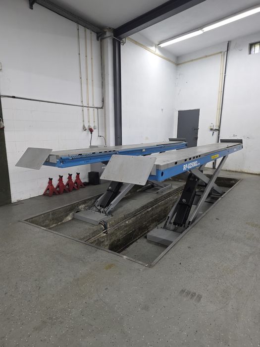 Elevador de dupla tesoura