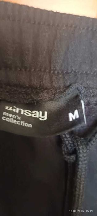 Spodnie dresowe typu baggy SINSAY