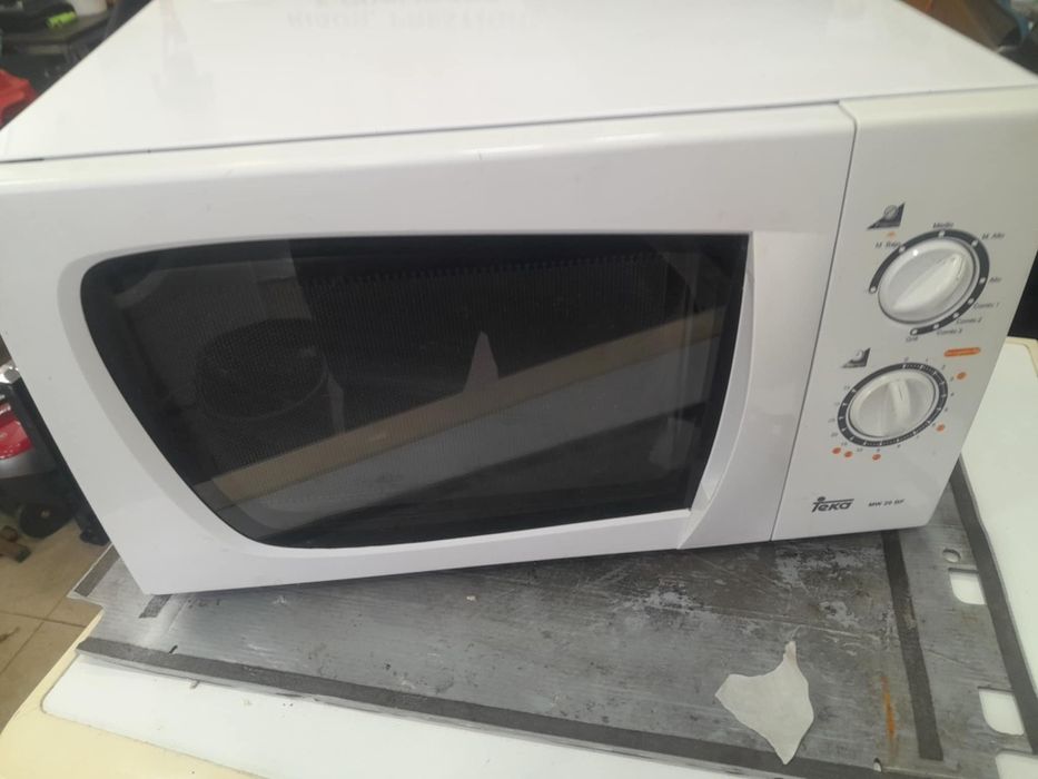 Microondas marca teka com griil 
35