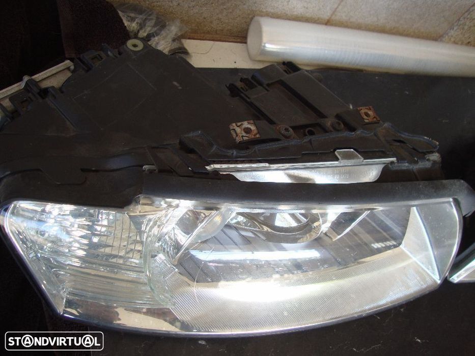 farois xenon direcionais Audi A8  pre-facelift grelha pequena