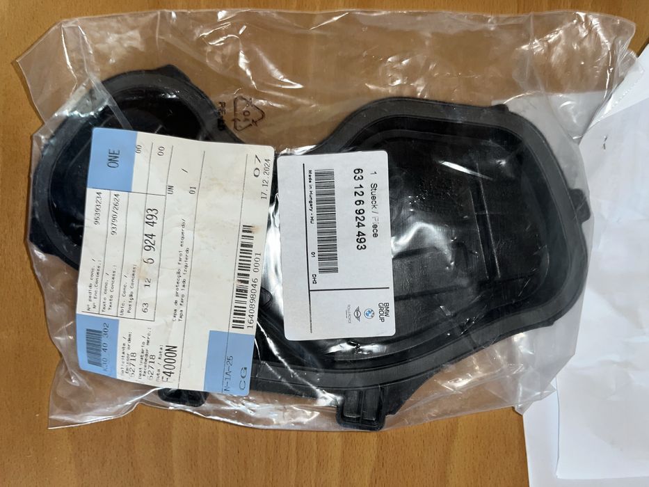 Tampa/Capa Protecção Farol ESQ BMW E81 (OEM) NOVA