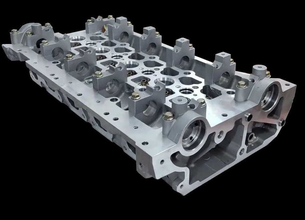 Головка блоку Nissan Opel Renault 2.2 2.5  1104100QA0 AMC 908797