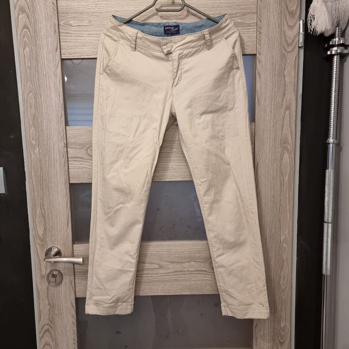 Beżowe damskie spodnie typu chino Biaggini rozm.S