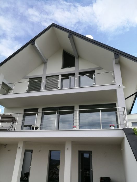 Elewacje domów jednorodzinnych/ Tynki / Podbitki / Ocieplenia