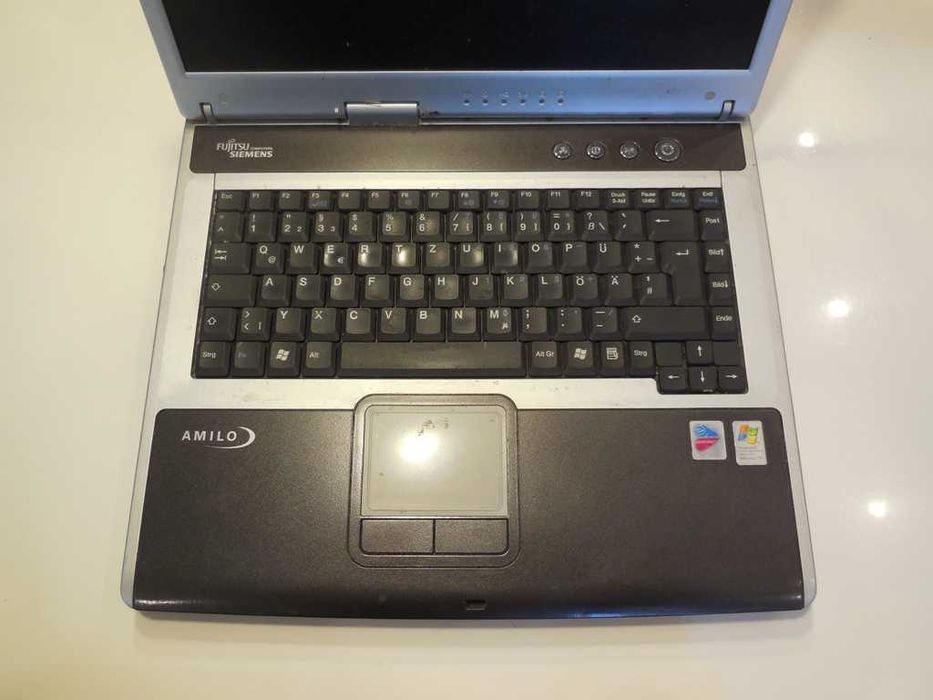 Laptop Fujitsu Siemens Amilo M7440 Pentium1.7 GHz RAM DDR2 1Gz HDD80GB