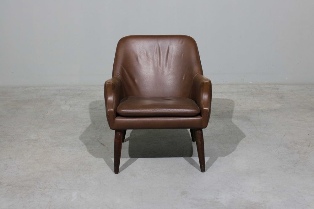 Poltrona vintage em couro | Design Nórdico | Mobiliário Vintage