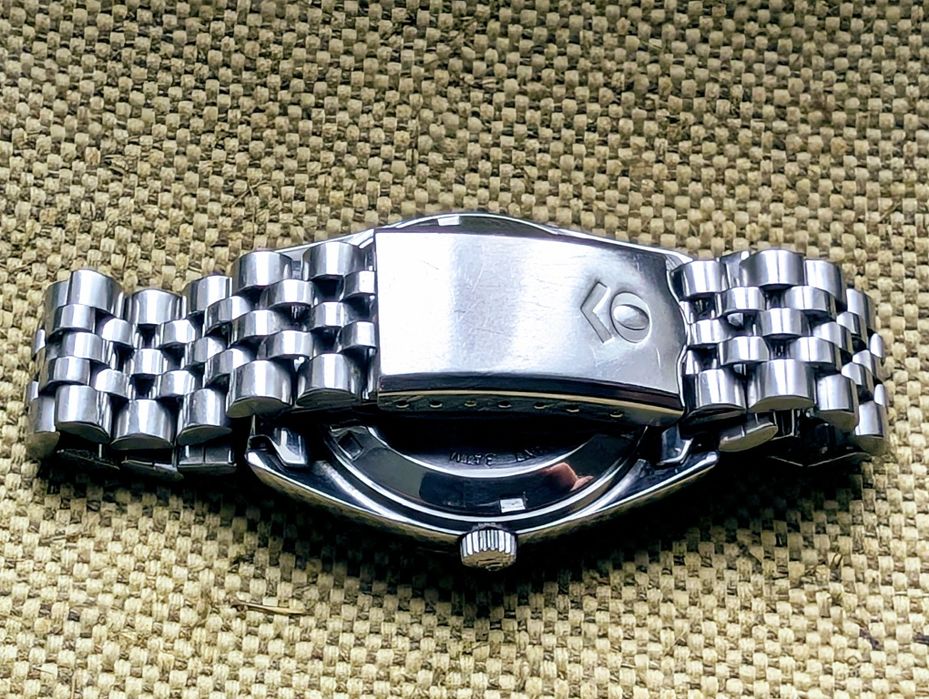 Швейцарские часы  Olma