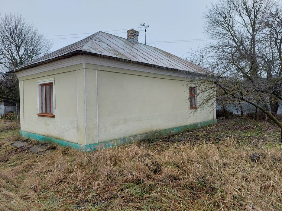 Продаж будинку з літньою кухею і прибудовами