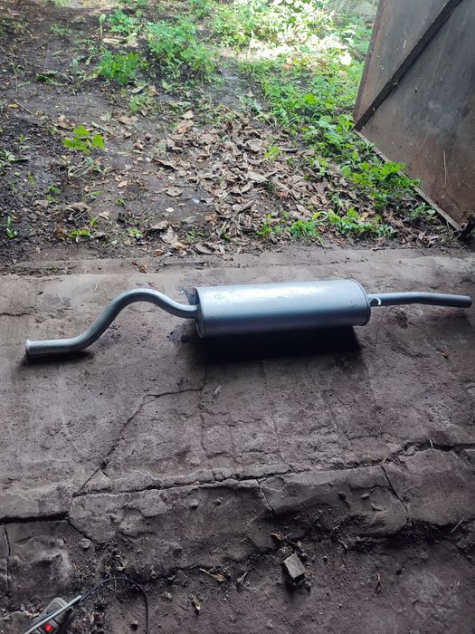 Продам глушитель новый