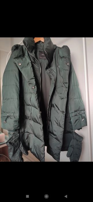 Puchowa kurtka w kolorze butelkowej zieleni