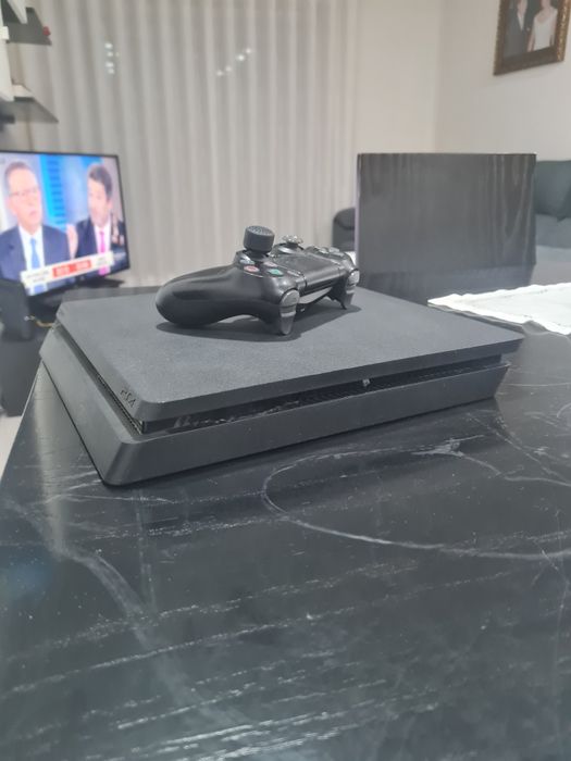 Vendo play4+comando+volante+jogos