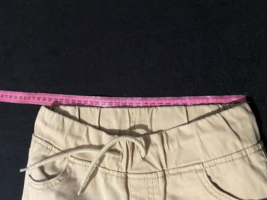 Бежеві штани для хлопчика 116-122