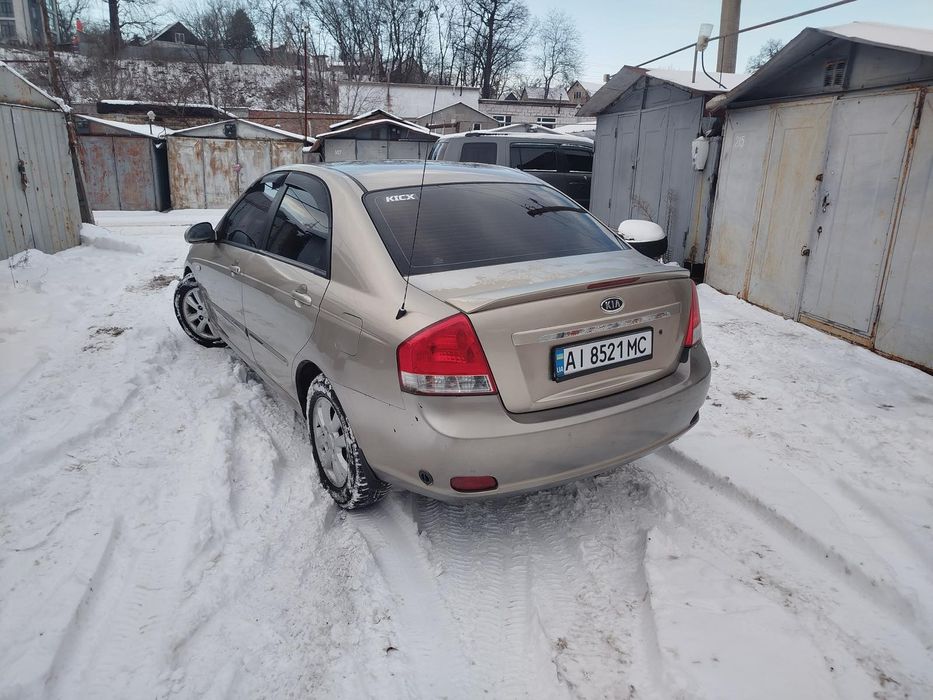 Kia cerato  2.0 автомат  газ-бензин