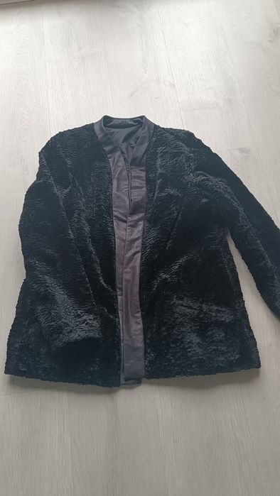 Casaco em pele "caraculo"