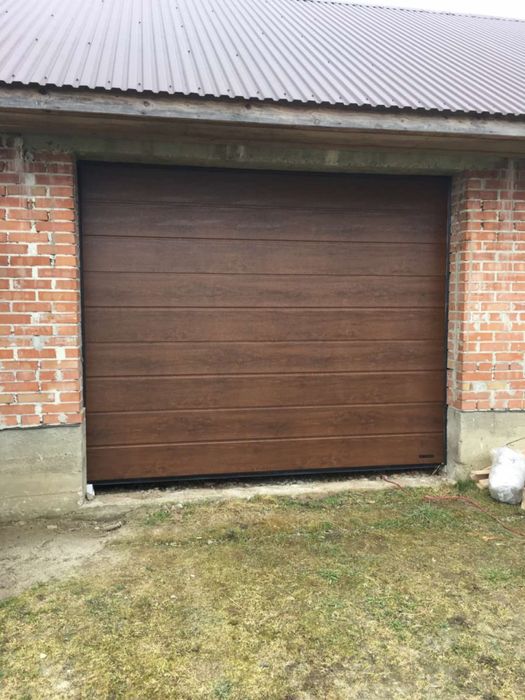 Секційні автоматичні ворота / ролети