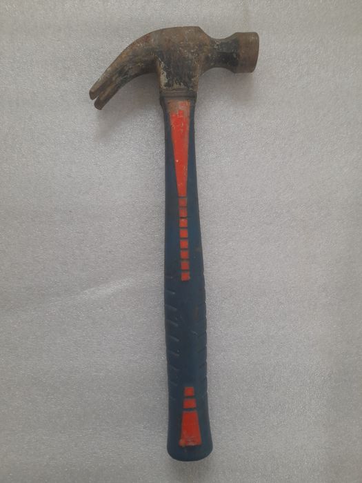 Молоток з цвяходером