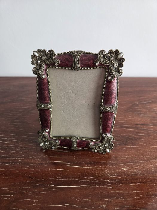 Moldura de mesa vintage em metal