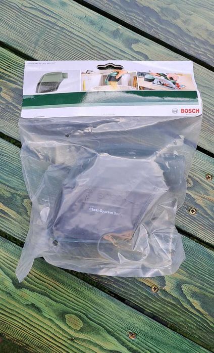 Pojemnik na pył CleanSystem Box firmy BOSCH do pilarek tarczowych.
