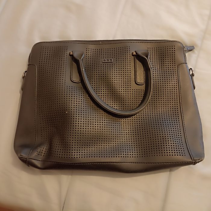 Black suitcase - space for laptop