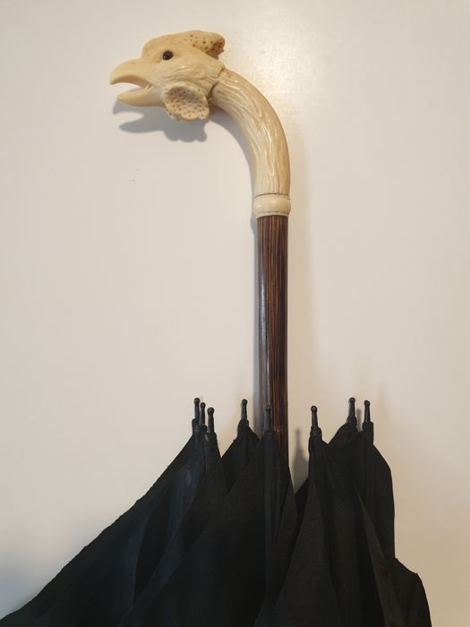 Fantastic antique Asian umbrella with a precious cock-shaped handle