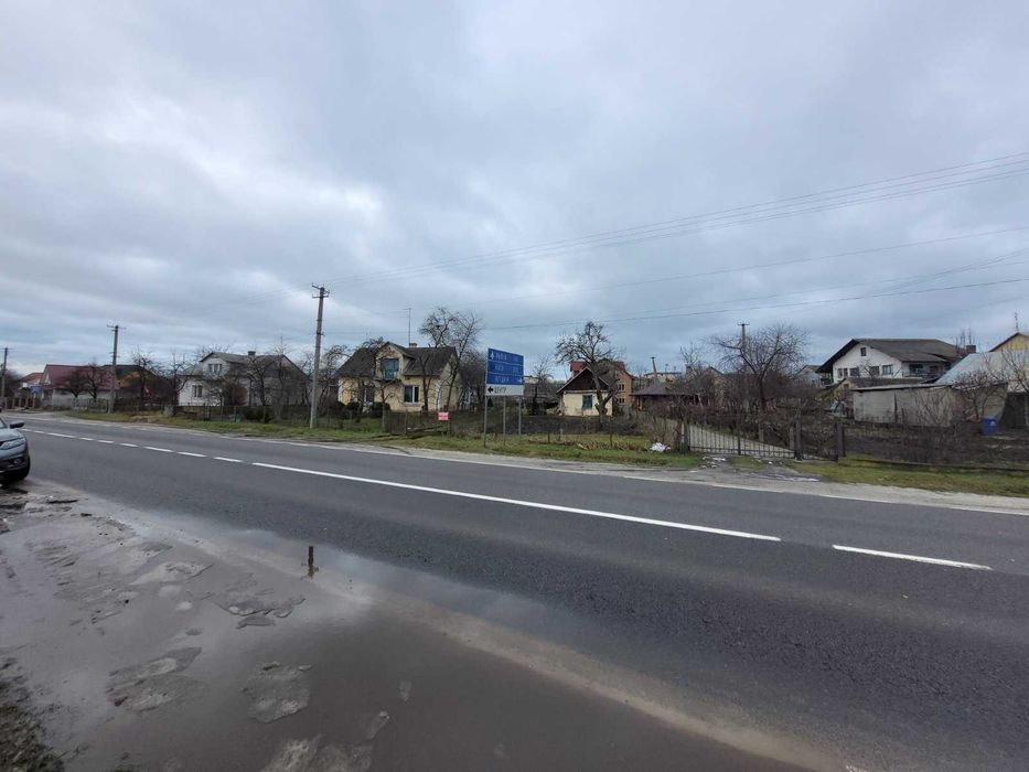 Дерев'яний будинок та земельна ділянка 14 сот. м. Кам'янка-Бузька