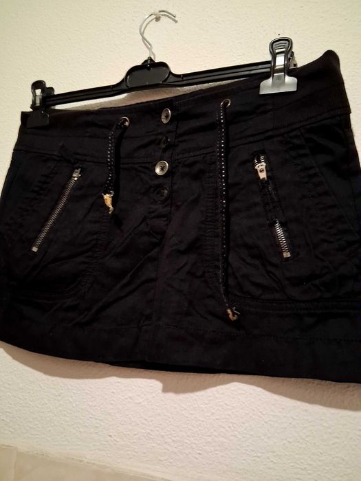 Saia Breskha,top H&M e short Rafthi.