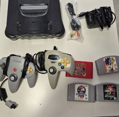 Sprzedam Nintendo 64 USA z modem na region japoński+2pady 3gry i super cartridge