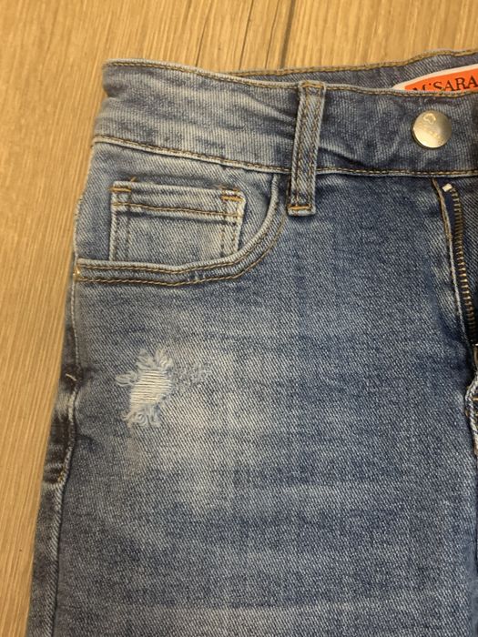 Niebieskie jeansy z dziuramu w kwiaty y2k vintage