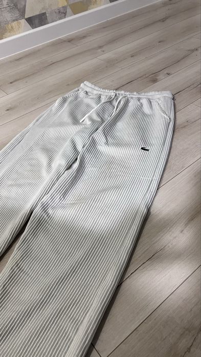 Продам білі штани Baggy | Lacoste