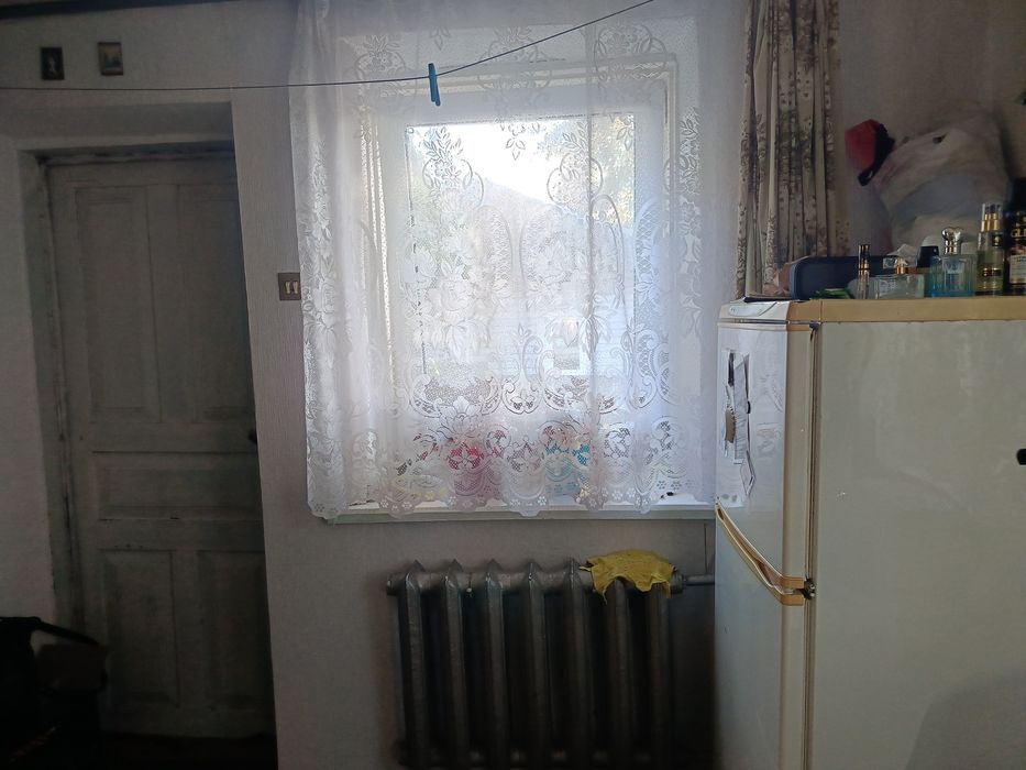 Продаж частини будинку поруч з центром