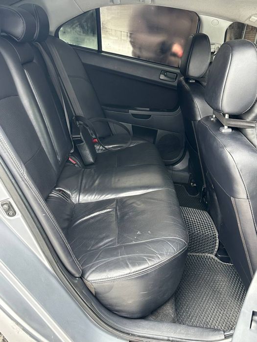 Mitsubishi lancer X автомат кожа на газу