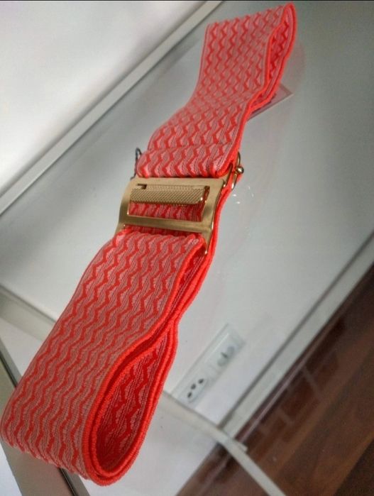 Pasek regulowany pomarańczowy pozłacany. Uniwersalny rozmiar.