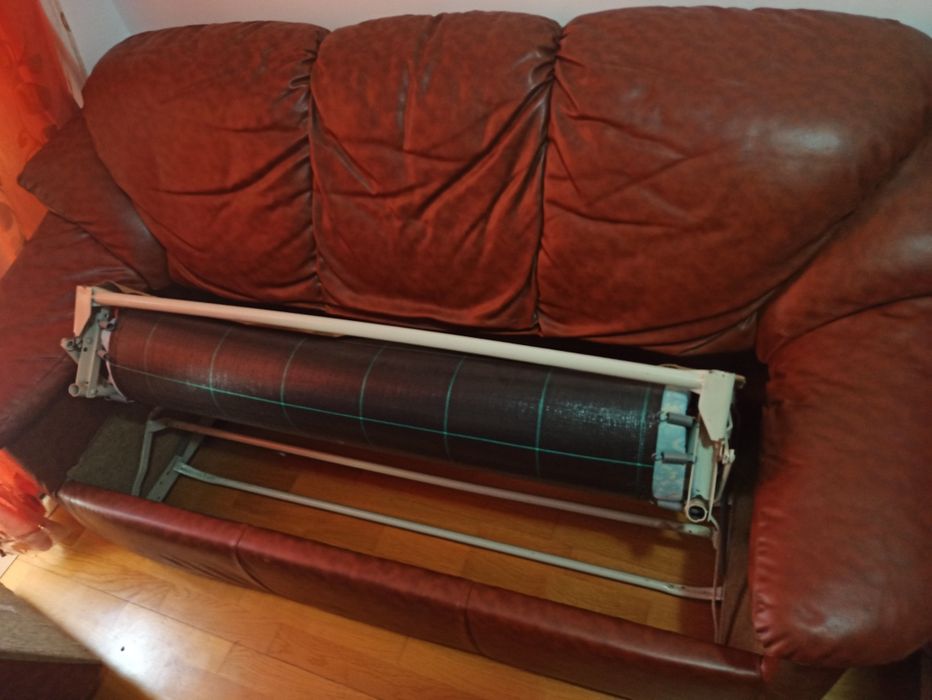 Sofá cama em pele