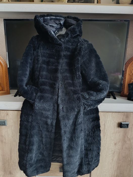 Жіночій пуховик дуже гарний і теплий