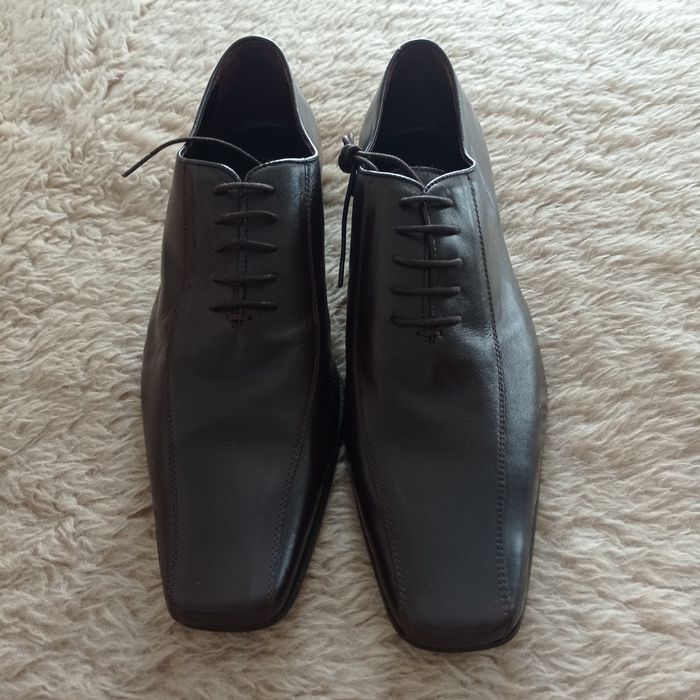 Sapatos em pele genuína