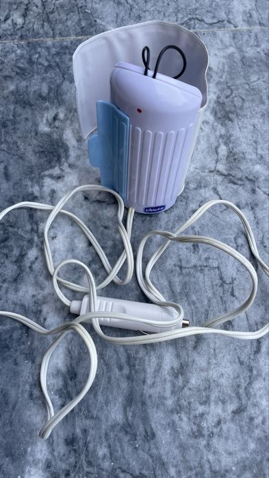 Aquecedor de biberão, funciona com isqueiro do carro muito util