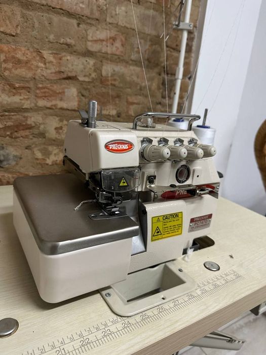 Оверлок -машинка Precious PC747D.