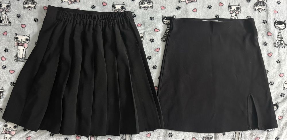 Міні-спідниці жіночі чорного кольору