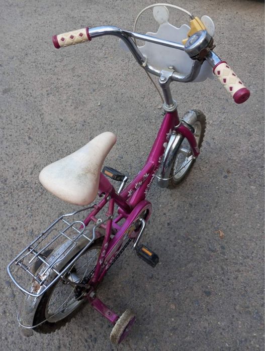 Дитячий рожевий велосипед