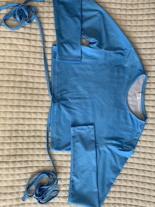 Спілниця та топ костюм