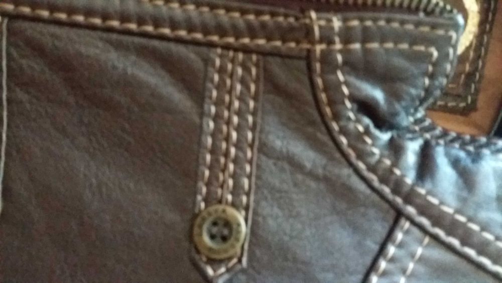 Casaco em pele genuína