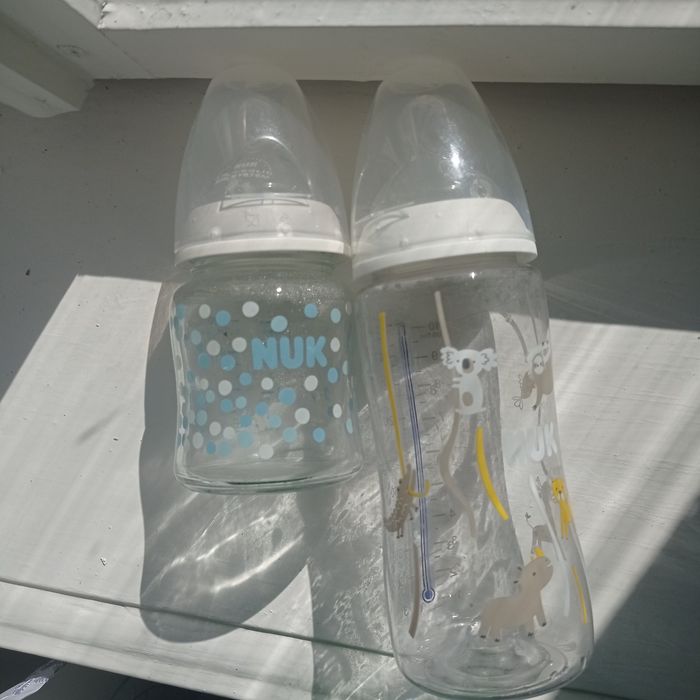 Бутилочки Nuk скляна 120 ml, пластикова 300 ml