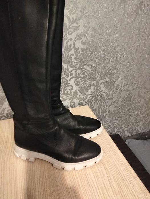 Продам кожаные сапоги фирменные в хорошем состоянии