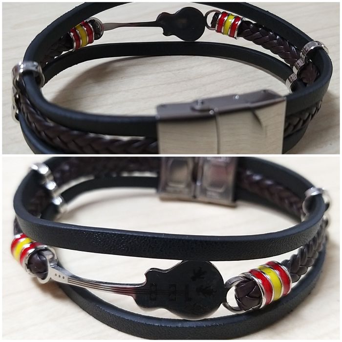 Pulseira em cabedal com guitarra.