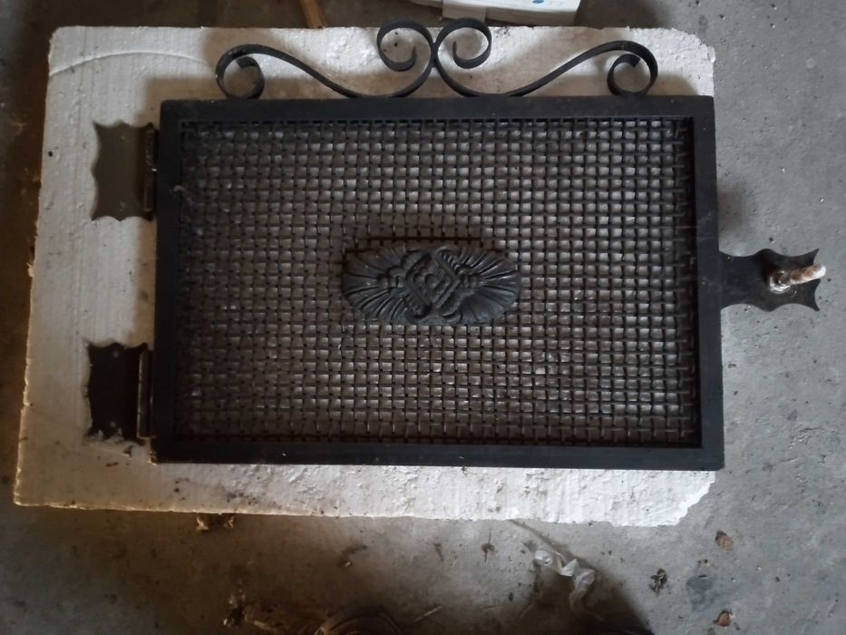 Porta e resguardo para fogão de sala feita em ferro